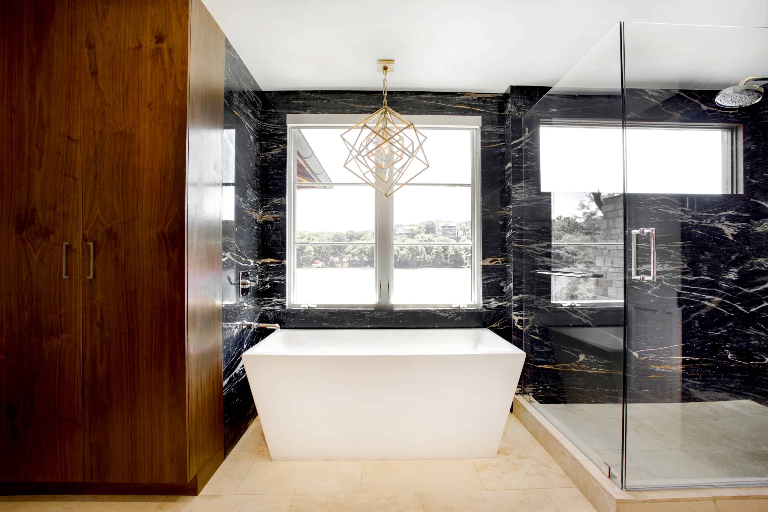 Natural stone goes naturally in this lovely bath