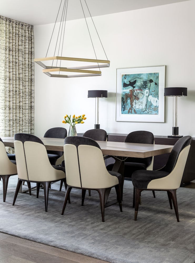 A view of the modern, elegant dining room in LEED certified home in Memorial