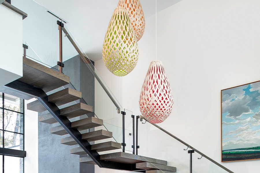 Colored ballon inspired lights in contemporary entry way designed by Laura U
