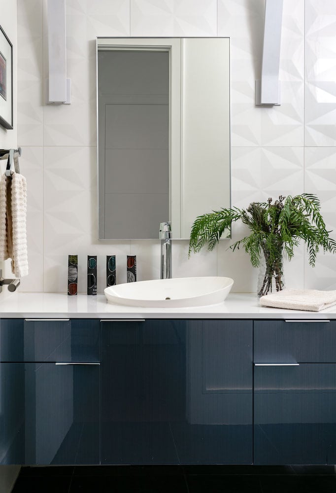 Contemporary blue and white powder bath with low-flow plumbing fixtures