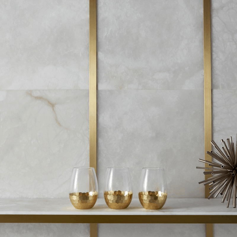 Creamy alabaster and gold metallic tile from Ann Sacks - Laura U Interior Design