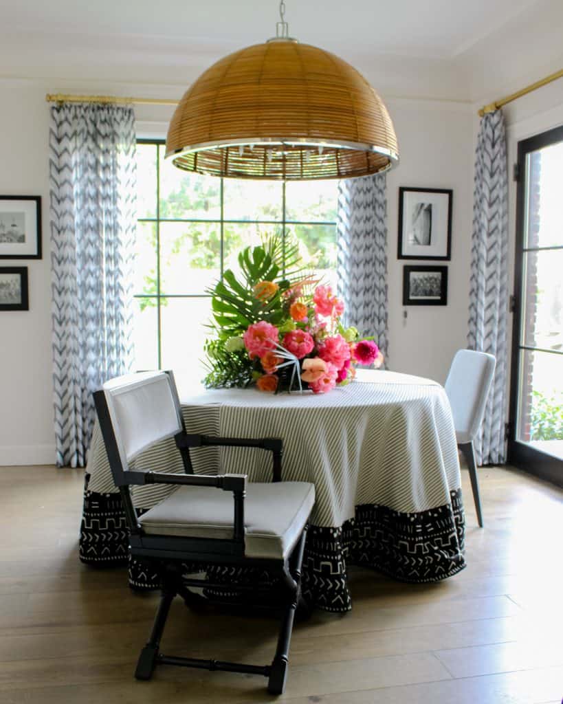 The Carayes in a breakfast room with chairs from Reeves Antiques