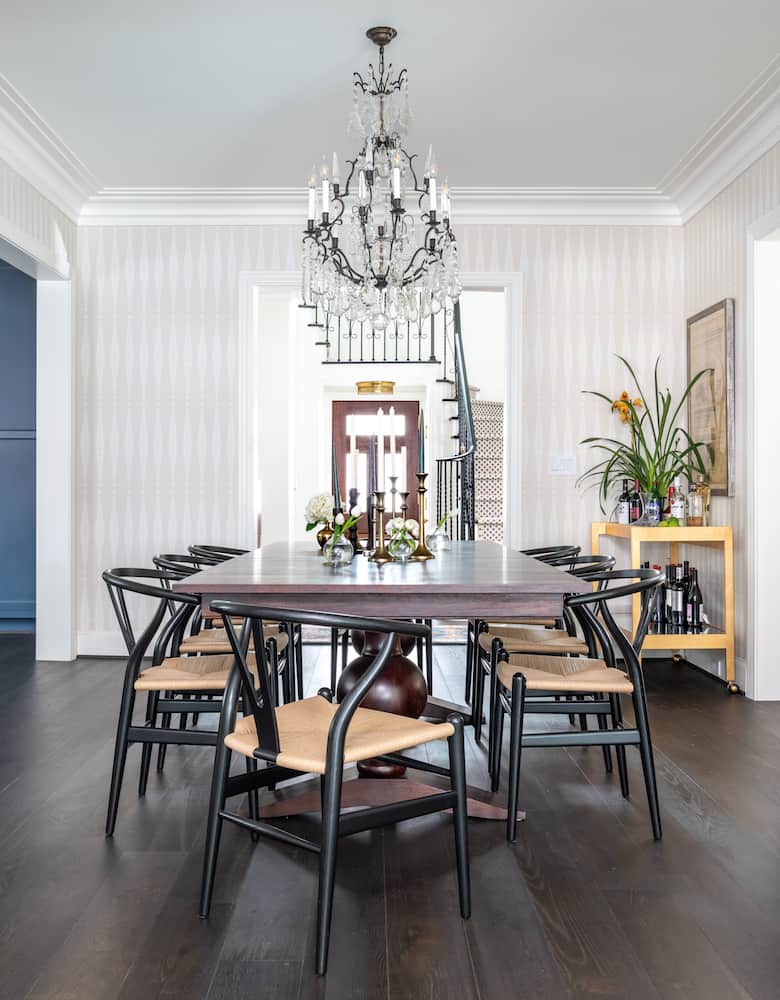 Houston home renovation design - dining room with chandelier and wishbone chairs