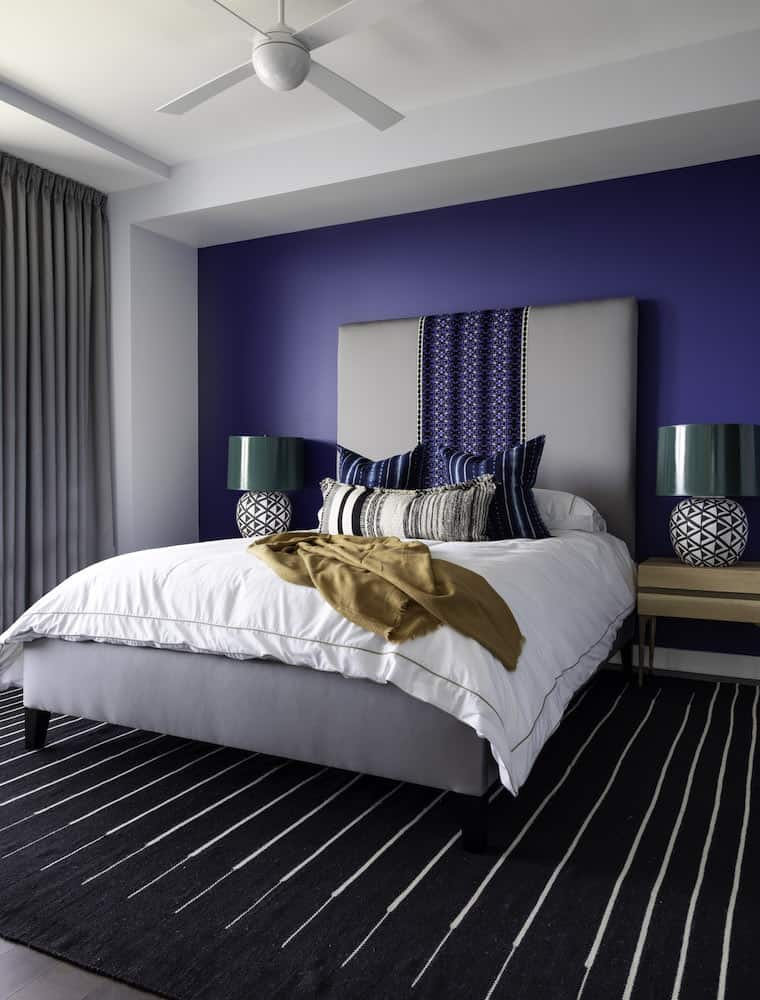 Interior designers The River Oaks | Cobalt, emerald and black guest bedroom by Laura U