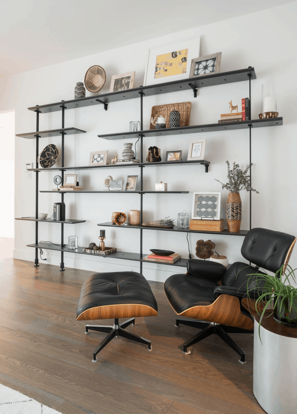 Modern industrial bookshelves with iconic objects worth collecting - Laura U Interior Designer