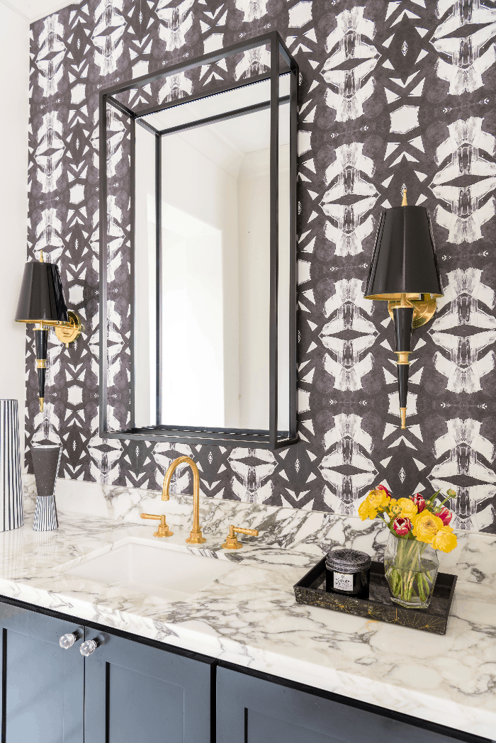 Powder rooms fo the win! You can never go wrong with black and white wallpaper.