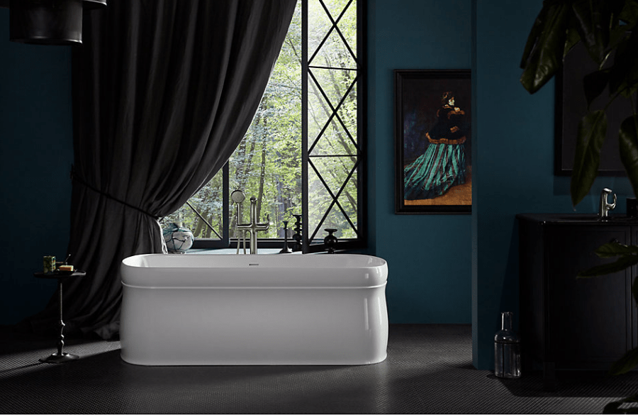 This moody bathroom receives an uplift from this beautiful white tub