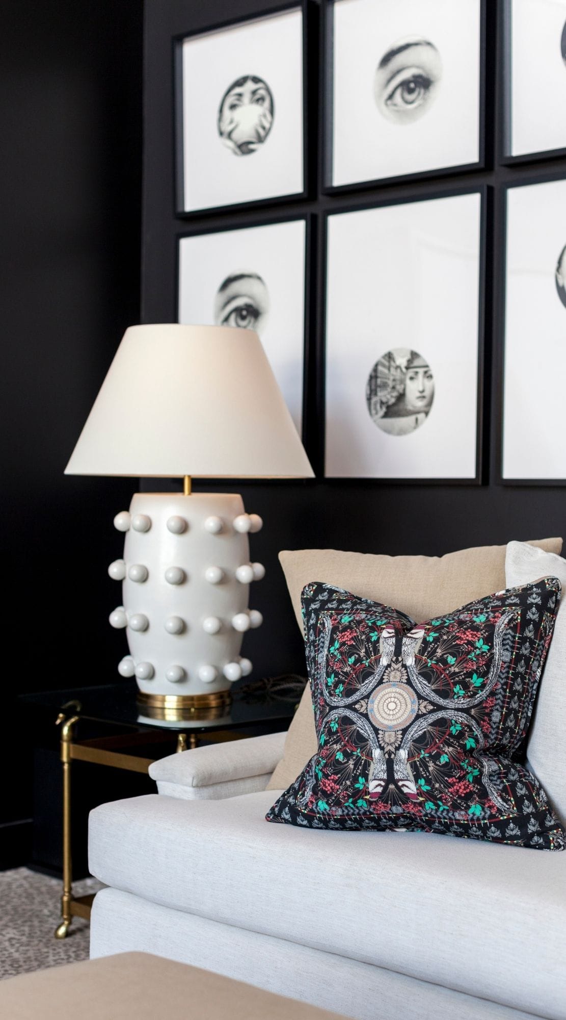 A Kelly Wearstler lamp in the high contrast family room of Interior Designer Laura Umansky