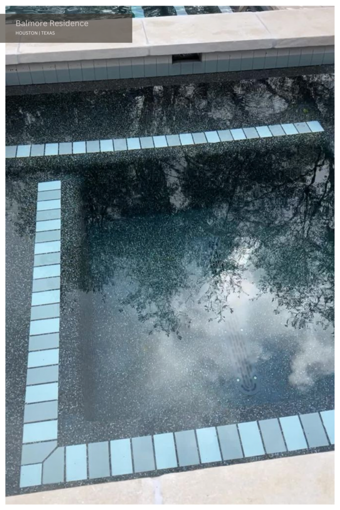 A close-up photo of pool tiles.