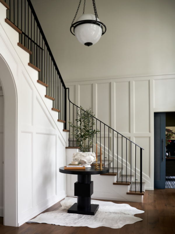 Entry way with a curving staircase in Balmore