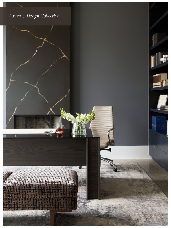 Minimalist, dark-toned home office interior design with gold-veined wall detail, modern desk, and neutral palette.