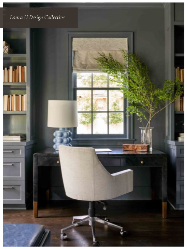 Dark-toned small home office with gray built-ins and a cozy desk facing a window for natural light.