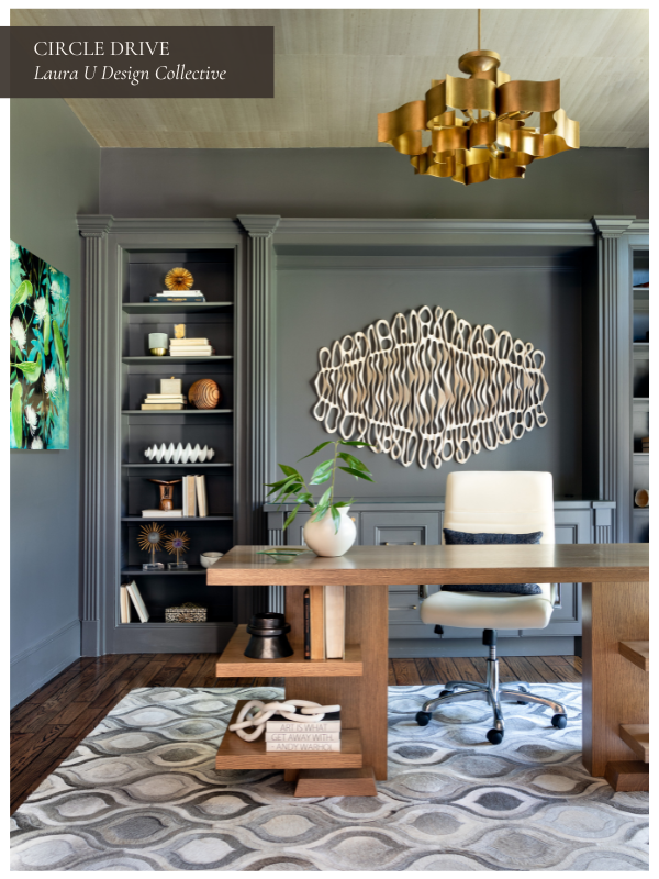 Bold home office design with gray built-ins, a sculptural wood desk, and white ergonomic desk chair.