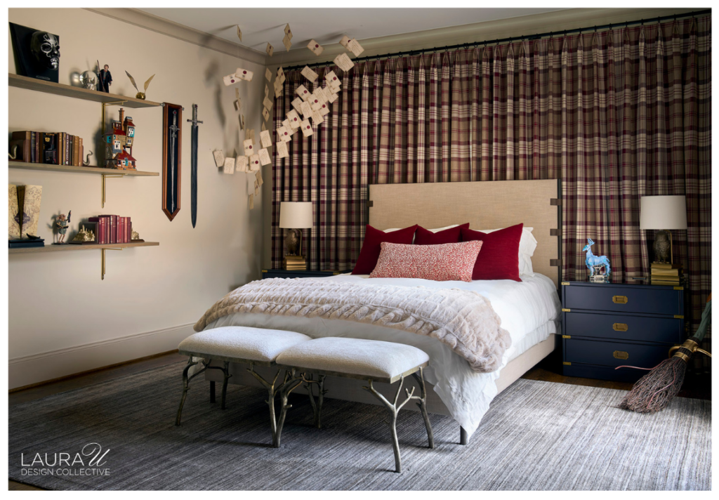 Harry Potter guest bedroom with floor-to-ceiling plaid drapery, burgundy pillows, navy nightstands, floating acceptance letters, wall-mounted wands, and a broom.