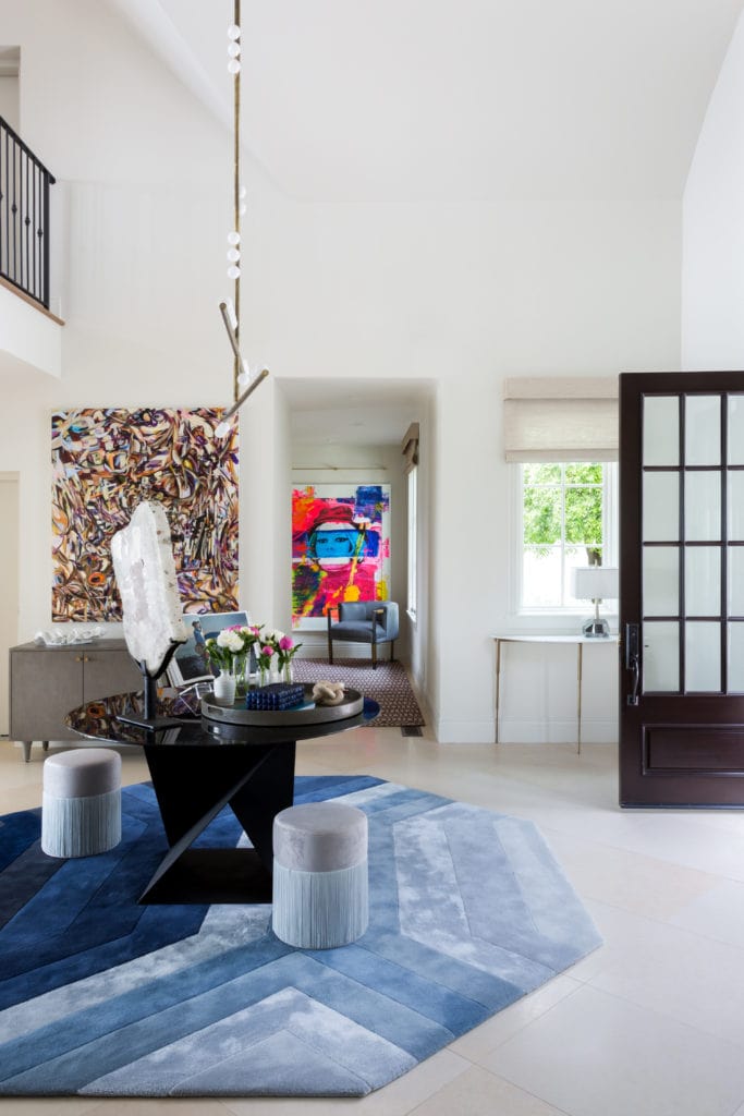 The entry to Viscaino, with blue rug from Tai Ping, in Pebble Beach and designed by Laura U