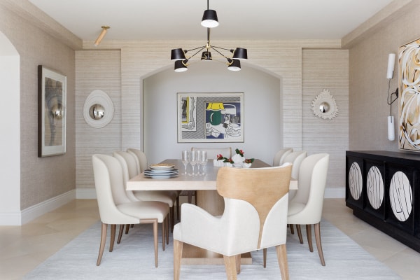 A neutral toned dining room in a Pebble Beach home, designed by Laura U