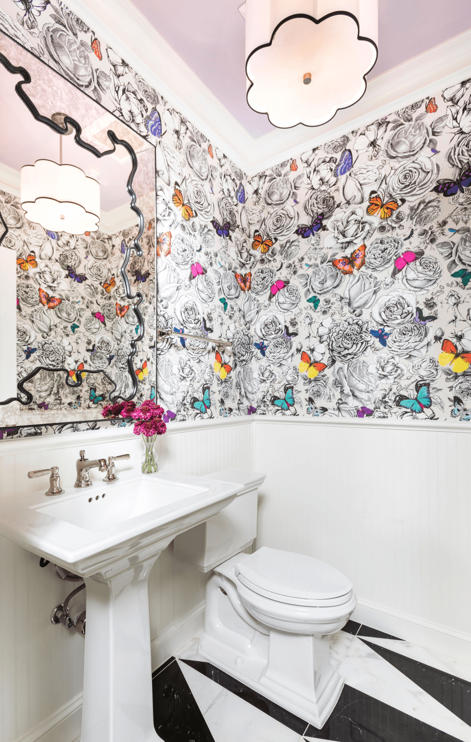 Creative powder bath with colorful wallpaper and matching mirror and pendant light by LauraU, Houston
