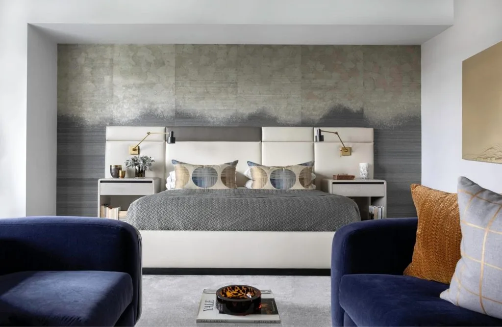 A stunning bedroom with a gorgeous blue and gray color palette!