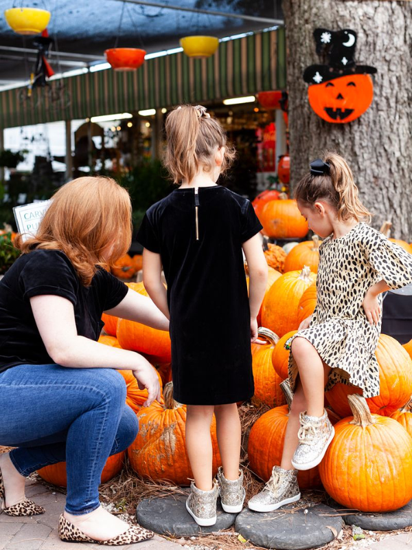 Laura and her children at a Houston Pumpkin Patch