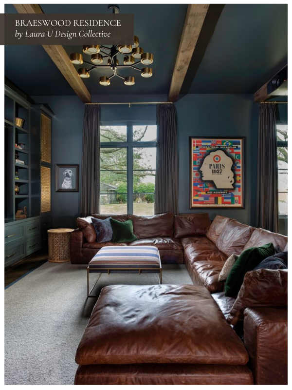 the living area with brown leather couch at Braeswood Residence