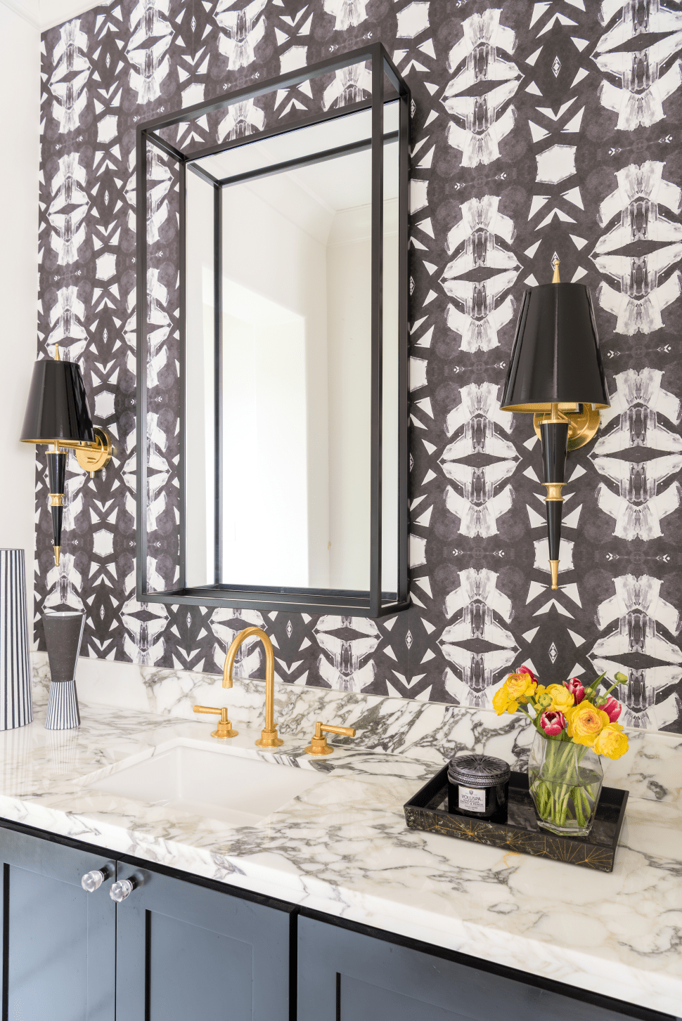 Powder room with black & white back wall,  contrasting countertop & black cabinets by LauraU. 