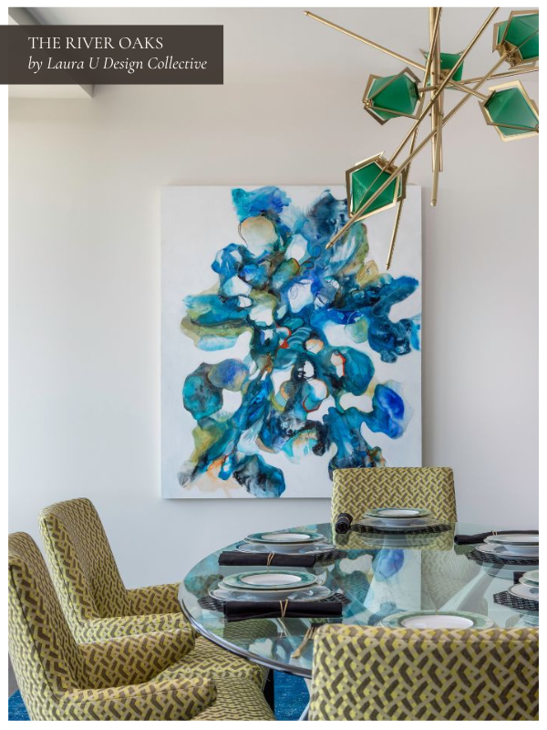 A gorgeous green, blue, and gold dining room with art by Cookie Ashton