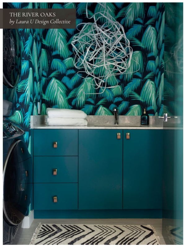 A bold green, teal, and blue laundry room with art by Matt Devine