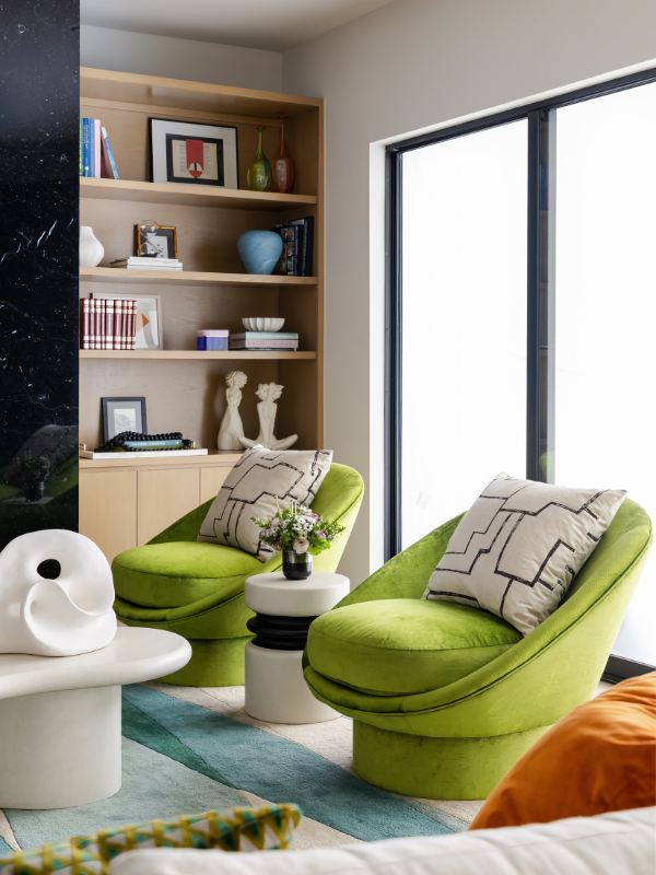 green chairs amid millwork and bold colors